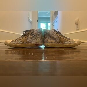 Personally customized high top golden goose. Very good condition.